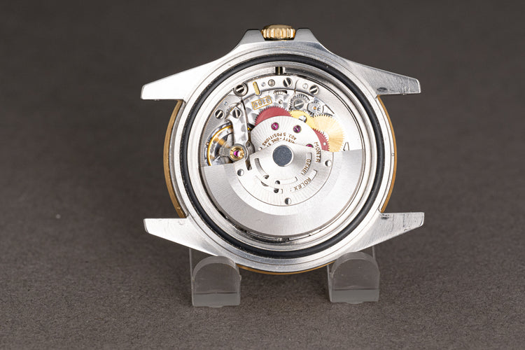 1991 Rolex 16713 18k/St GMT Master II Champagne Ruby & Diamond Serti Dial