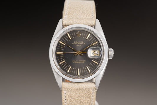 1971 Rolex Date Model 1500 with Gray Dial, Gilt Hands, Gilt Baton Markers on Strap with Service Papers