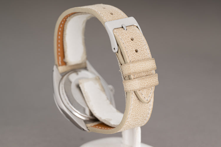 1971 Rolex Date Model 1500 with Gray Dial, Gilt Hands, Gilt Baton Markers on Strap with Service Papers