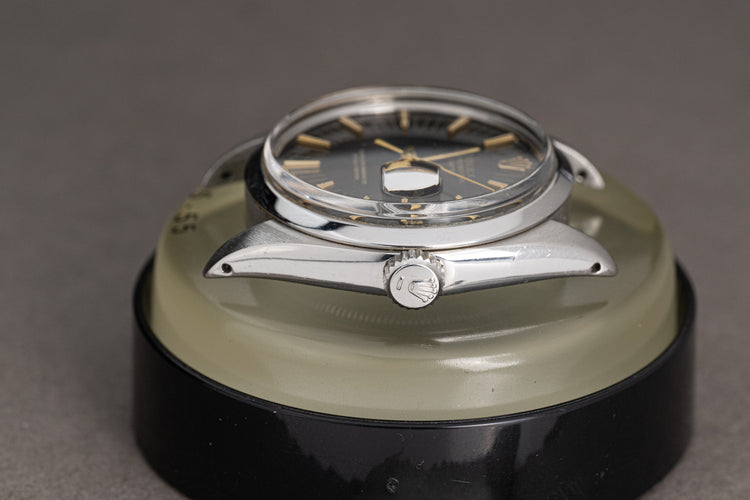 1971 Rolex Date Model 1500 with Gray Dial, Gilt Hands, Gilt Baton Markers on Strap with Service Papers