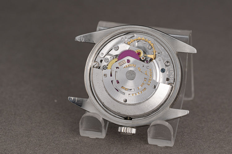 1971 Rolex Date Model 1500 with Gray Dial, Gilt Hands, Gilt Baton Markers on Strap with Service Papers