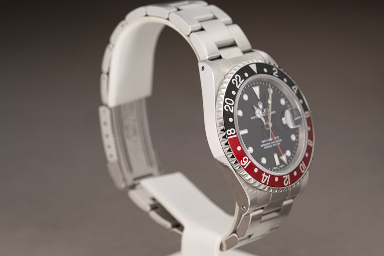 1999 Rolex 16710 GMT Master II Coke Bezel