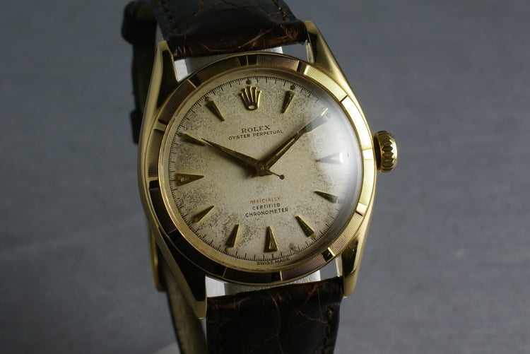 1952 Rolex 18K Oyster Perpetual 6085 with red “officially” on the dial