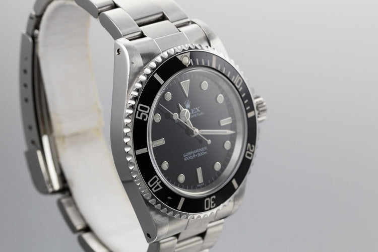 1998 Rolex Submariner 14060 with "SWISS" Only Dial