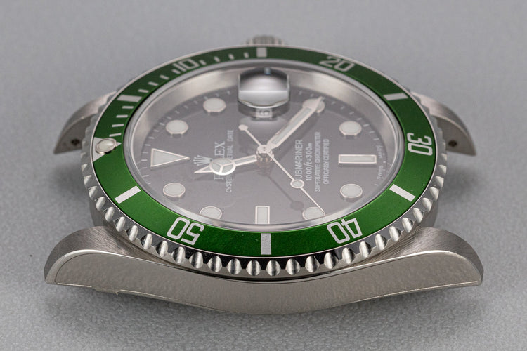 Mint 2003 Rolex Anniversary Green Submariner 16610LV with Box and Papers,Flat 4 Bezel, and Protective Stickers