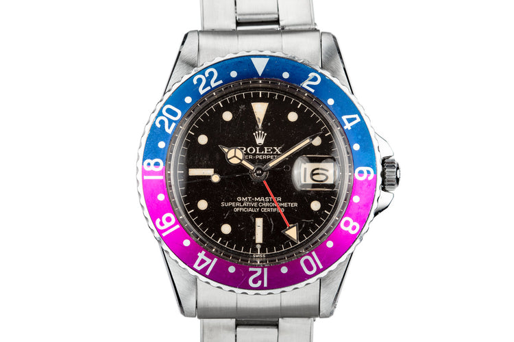 1960 Rolex GMT-Master 1675 with Pointed Crown Guard Case, Gilt Exclamation Dial, and Fuchsia Bezel Insert with Papers