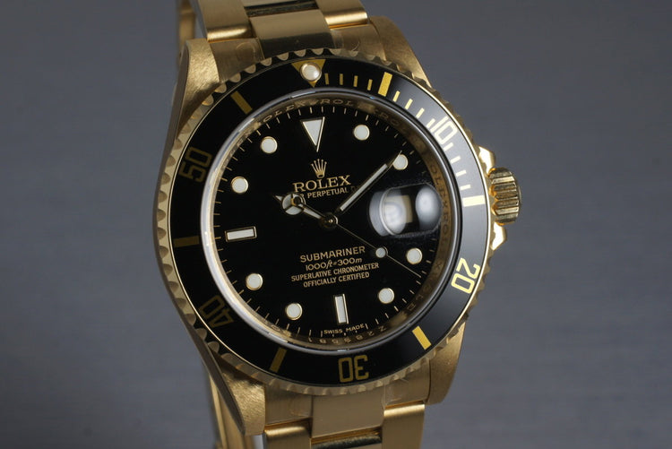 2006 Rolex YG Submariner 16618 with Box and Papers MINT with stickers
