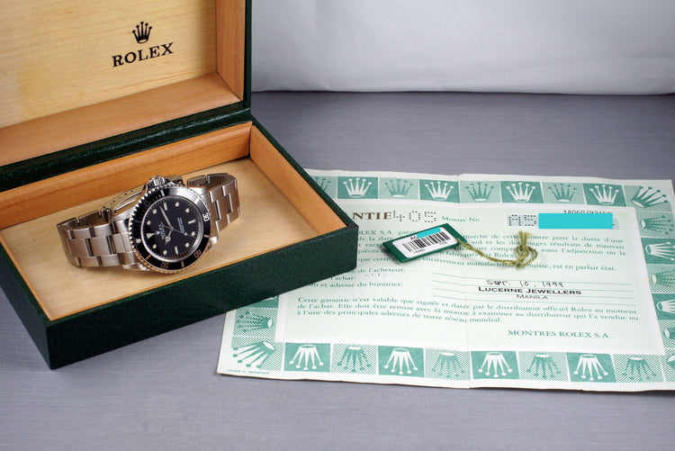 1999 Rolex Submariner 14060 with Box and Papers
