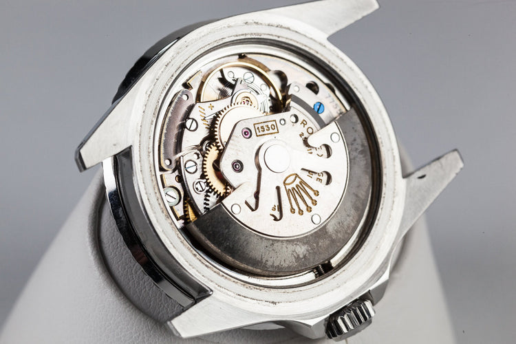 1959 Rolex Submariner 5512 with Tropical Gilt Chapter Ring Dial, Red Triangle Bezel, and Big Logo Stretch Bracelet