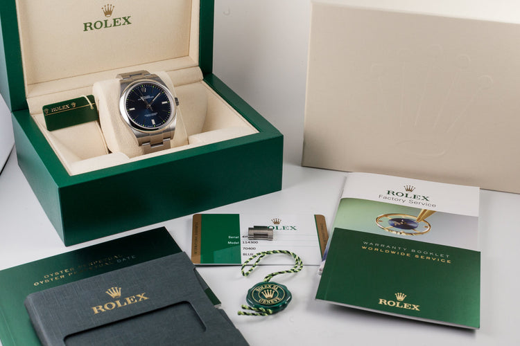 2015 Rolex Oyster Perpetual 114300 Blue Dial with Box and Papers