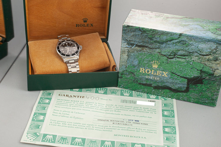 1999 Rolex Submariner 14060 with SWISS Only Dial with Box and Papers