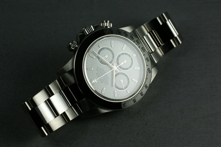 Rolex SS Zenith Daytona 16520 “white dial ” MINT and unpolished Box and papers