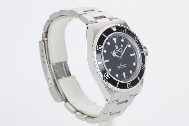 1998 Rolex Submariner 14060 with Box, Papers, Hangtag and Cloth.