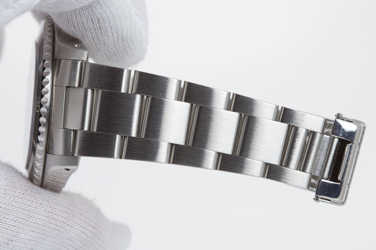 1998 Rolex Submariner 14060 with Box, Papers, Hangtag and Cloth.