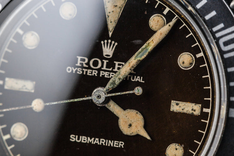 1959 Rolex Submariner 5512 with Tropical Gilt Chapter Ring Dial, Red Triangle Bezel, and Big Logo Stretch Bracelet