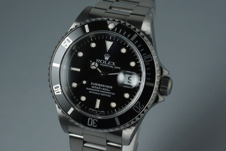 1990 Rolex Submariner 16610 with Rolex Service Card