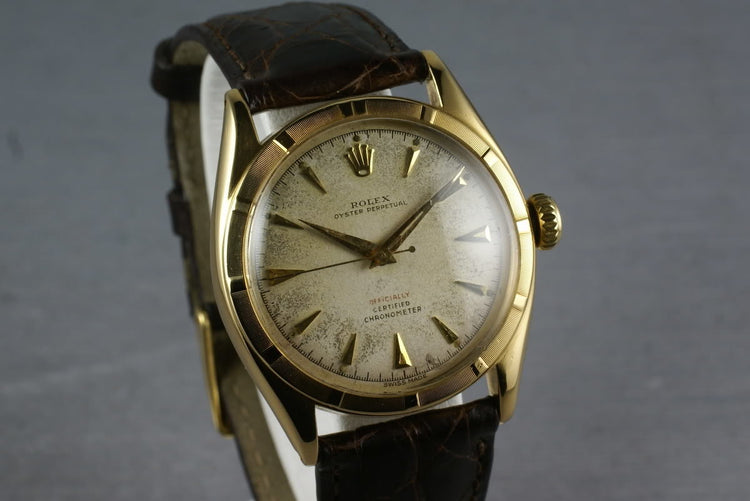 1952 Rolex 18K Oyster Perpetual 6085 with red “officially” on the dial