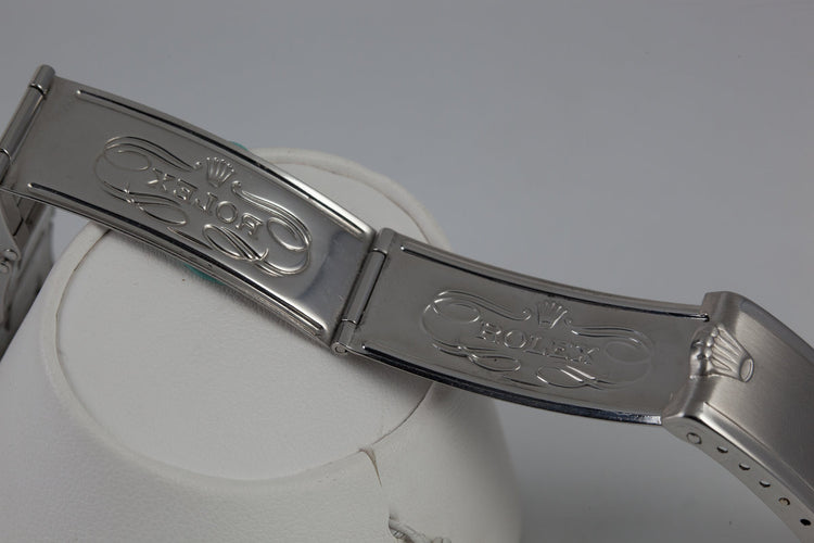 1959 Rolex Submariner 5512 with Tropical Gilt Chapter Ring Dial, Red Triangle Bezel, and Big Logo Stretch Bracelet