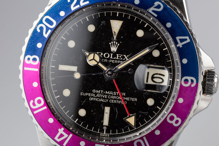 1960 Rolex GMT-Master 1675 with Pointed Crown Guard Case, Gilt Exclamation Dial, and Fuchsia Bezel Insert with Papers