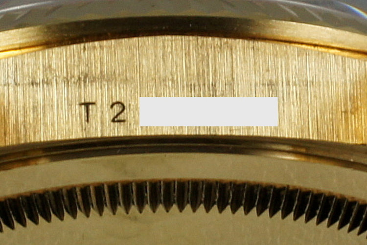 1995 Rolex YG Day-Date 18238 with Black Diamond Dial