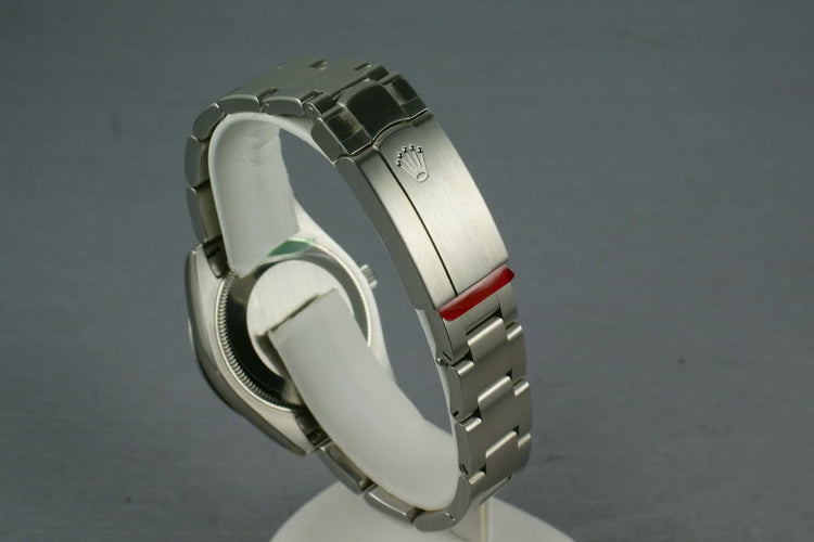 Rolex Midsize Oyster Black Arabic Numbers and Blue Markers 177210