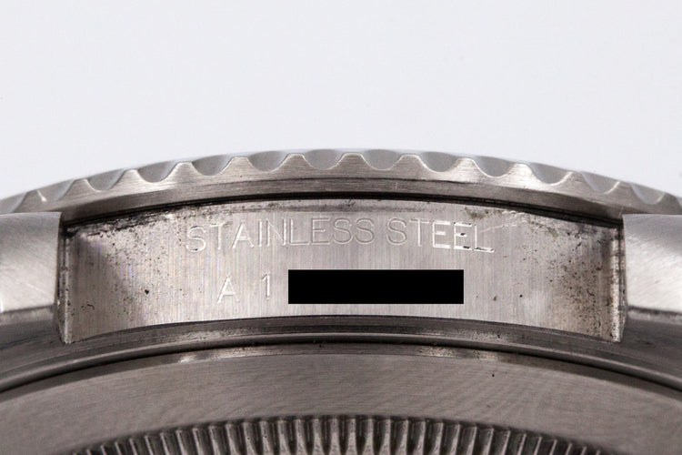 1999 Rolex Submariner 14060 with uncommon SWISS only dial