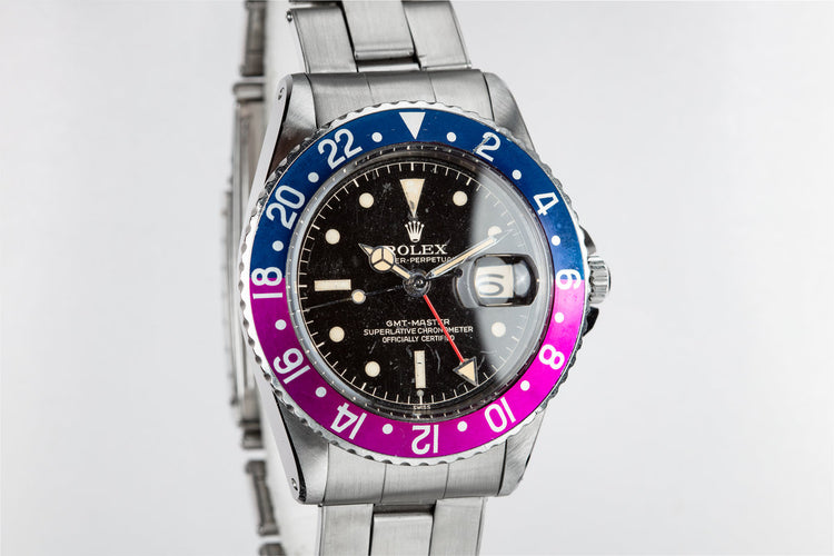 1960 Rolex GMT-Master 1675 with Pointed Crown Guard Case, Gilt Exclamation Dial, and Fuchsia Bezel Insert with Papers