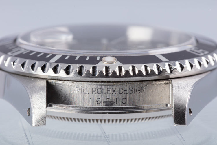 1999 Rolex Submariner 16610 with Box & Papers "Swiss Only" Dial Box, Papers & Service Card