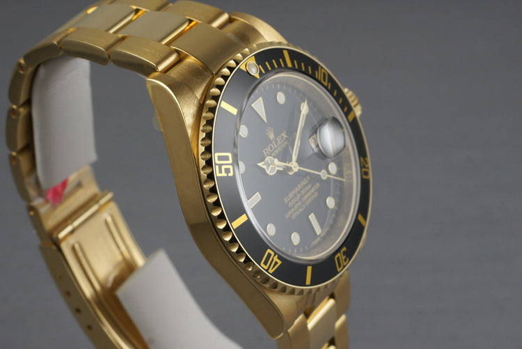 2006 Rolex YG Submariner 16618 with Box and Papers MINT with stickers