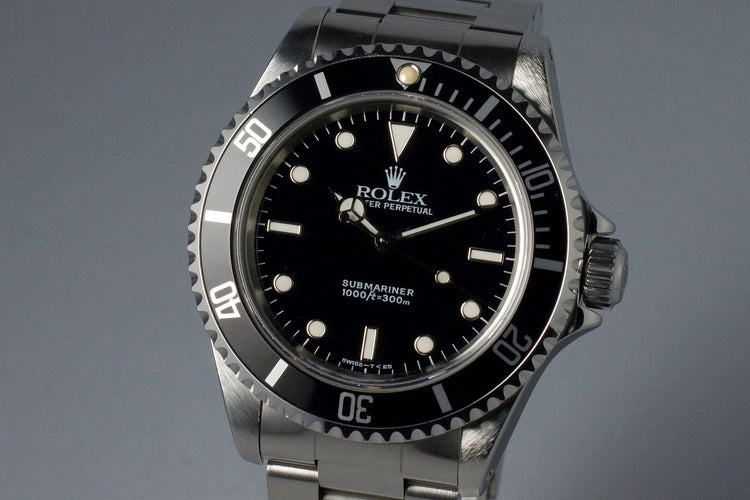 1995 Rolex Submariner 14060 with Box and Papers