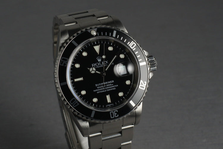 Rolex Submariner 16610 with Box and Papers