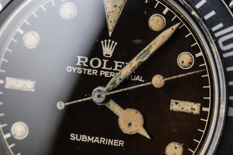 1959 Rolex Submariner 5512 with Tropical Gilt Chapter Ring Dial, Red Triangle Bezel, and Big Logo Stretch Bracelet