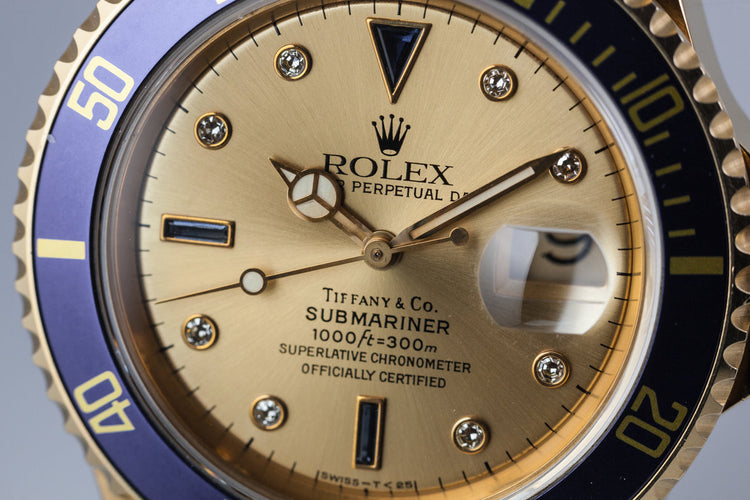 1990 Rolex YG Submariner 16618 Gold Tiffany & Co. Dial with Sapphire and Diamonds