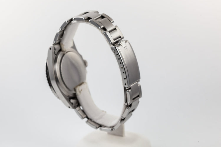 1959 Rolex Submariner 5512 with Tropical Gilt Chapter Ring Dial, Red Triangle Bezel, and Big Logo Stretch Bracelet