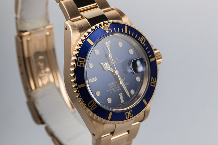2002 Rolex 18K YG Submariner 16618 Blue Dial