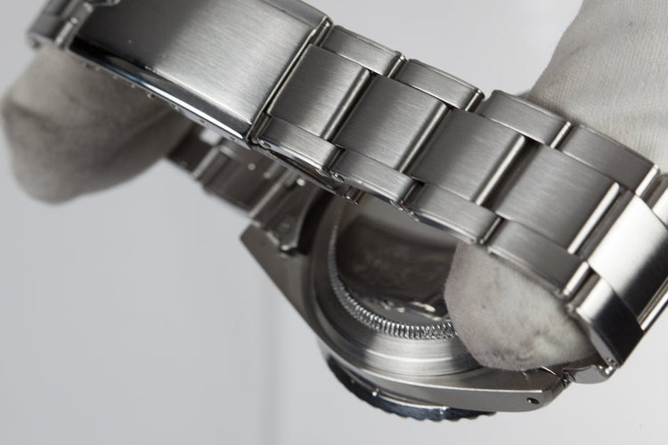 1959 Rolex Submariner 5512 with Tropical Gilt Chapter Ring Dial, Red Triangle Bezel, and Big Logo Stretch Bracelet