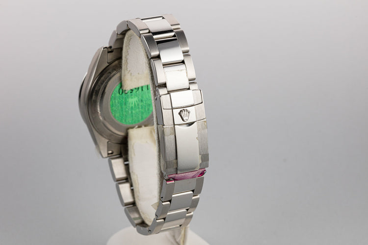 2003 Rolex Daytona 116520 Black Dial Still In Factory Protective Stickers with Box and Papers