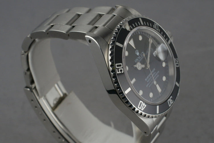 1991 Rolex Submariner 16610 with RSC Service Papers