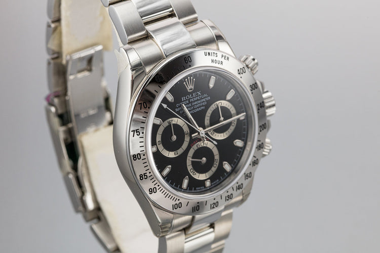 2003 Rolex Daytona 116520 Black Dial Still In Factory Protective Stickers with Box and Papers