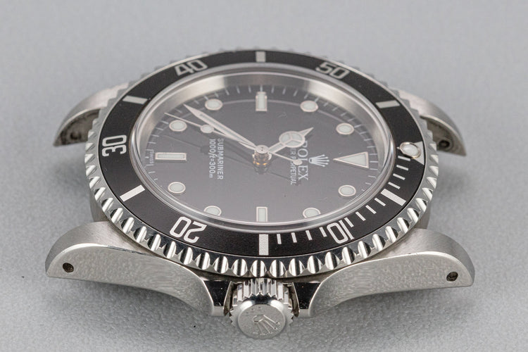 1999 Rolex Submariner 14060 "SWISS" Only Dial