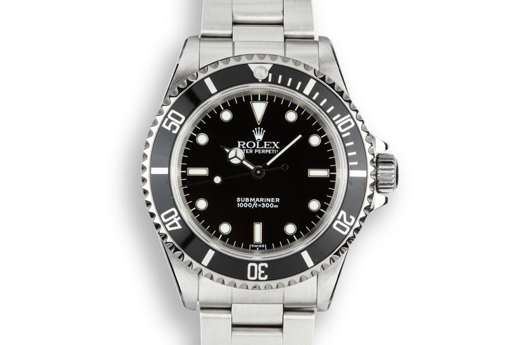 1999 Rolex Submariner 14060 with SWISS Only Dial