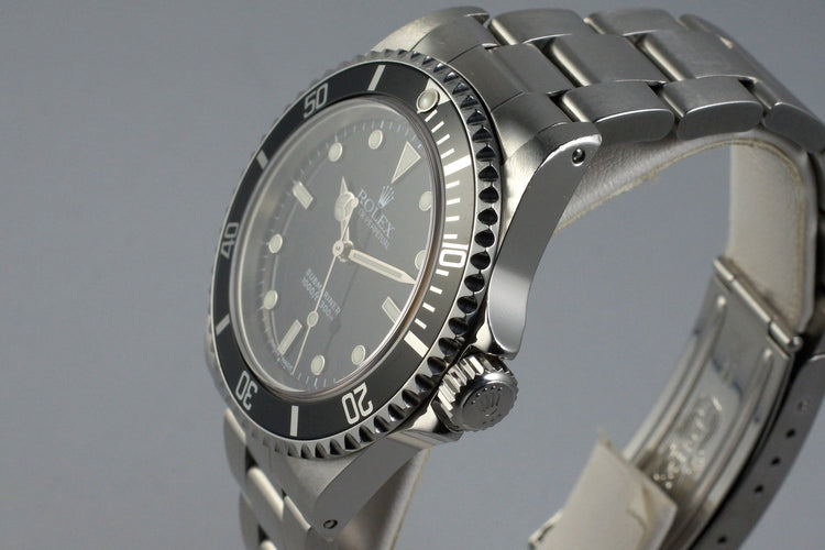 2002 Rolex Submariner 14060M with Box and Papers