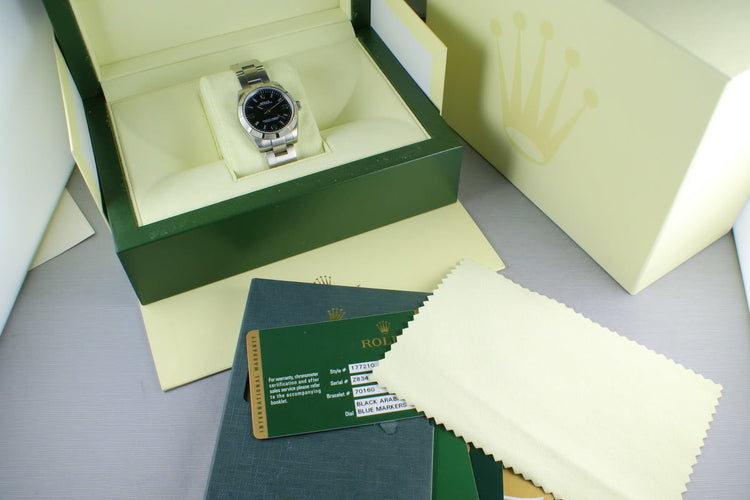 Rolex Midsize Oyster Black Arabic Numbers and Blue Markers 177210