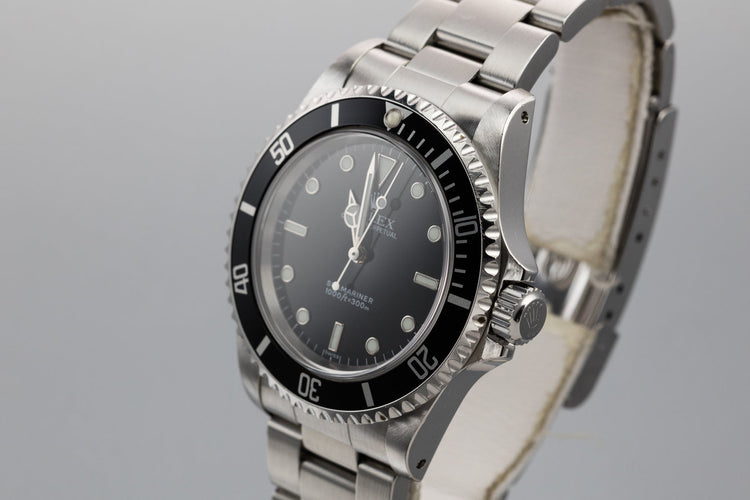 1999 Rolex Submariner 14060 with SWISS Only Dial