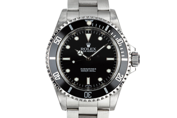 1999 Rolex Submariner 14060 with SWISS Only Dial
