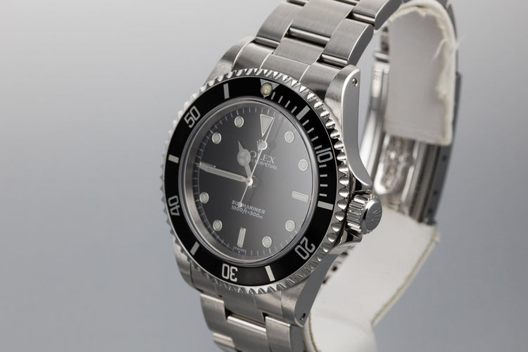1999 Rolex Submariner 14060 with SWISS Only Dial