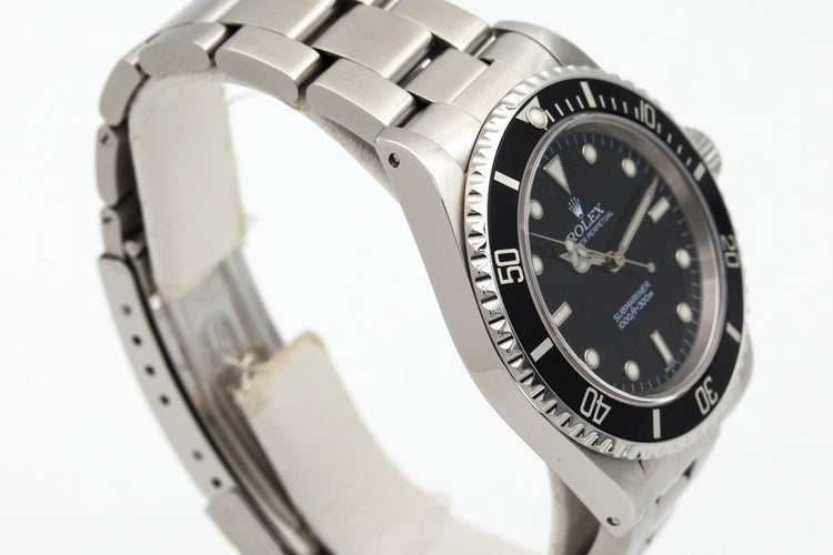 1999 Rolex Submariner 14060 SWISS only dial