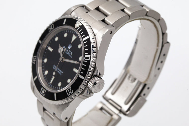 1999 Rolex Submariner 14060 SWISS only dial