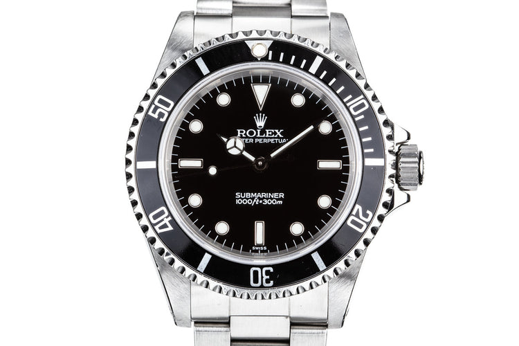1999 Rolex Submariner 14060 with SWISS Only Dial