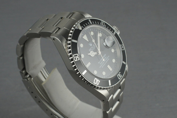 Rolex Submariner 16610 with Box and Papers